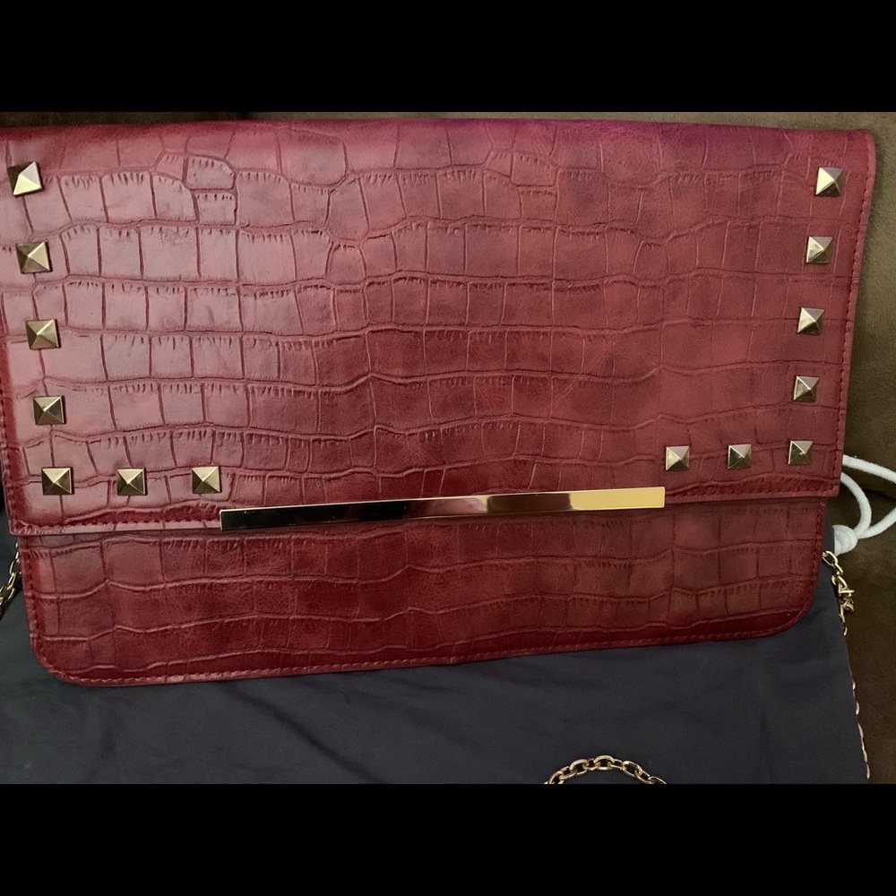 Luxury vegan rockstud clutch bag